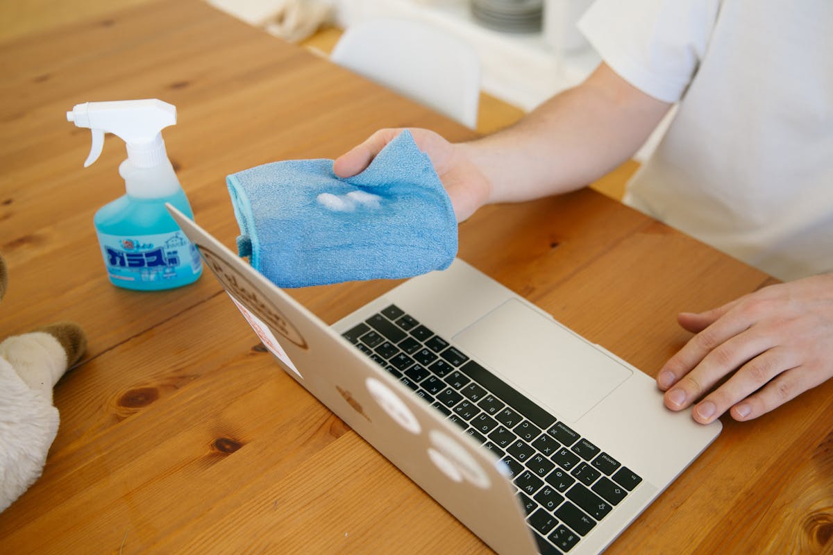 IPA disinfection of office laptop keyboard in Sydney